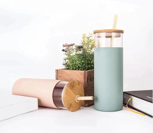 Rarejoy reusable glass sipper bottle with bamboo lid and straw, silicone grip sleeve, and leakproof design for water, juice, iced coffee, smoothies, and everyday hydration.