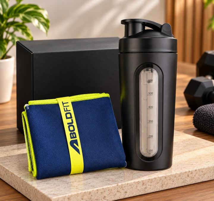 Gym lover gift hamper with black shaker bottle and Boldfit workout towel in a premium gift box