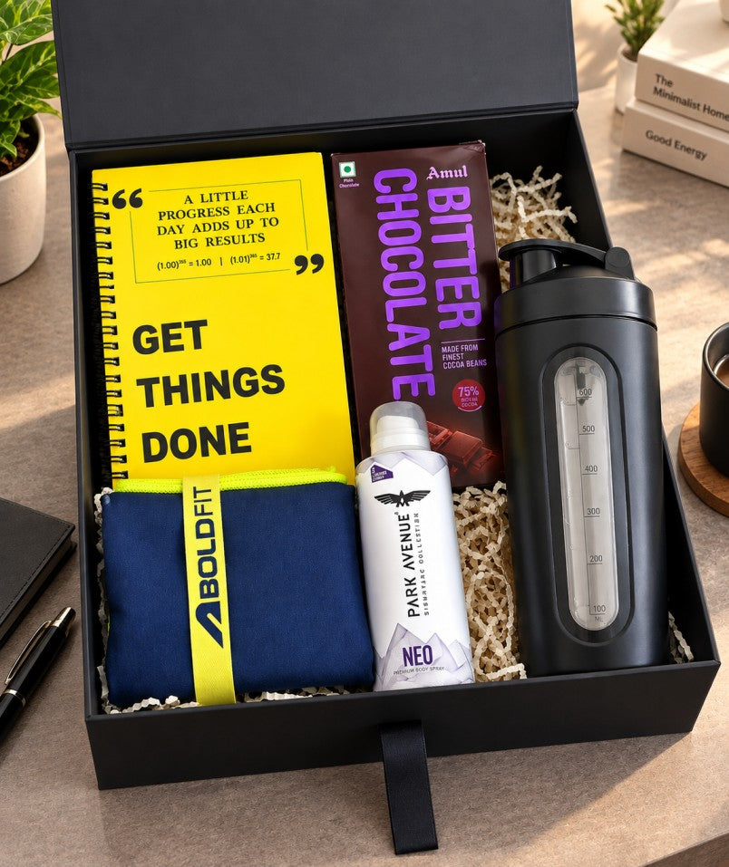 Premium gym lover gift hamper with shaker bottle, Boldfit gym towel, motivational notebook, chocolate and body spray