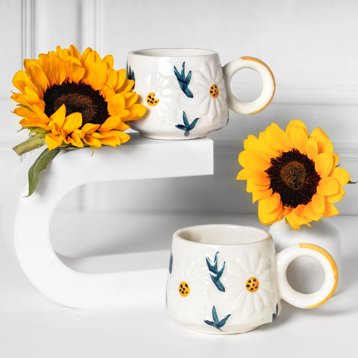 Handcrafted ceramic floral mug with an elegant botanical design and comfortable handle, perfect for coffee, tea, hot chocolate, and everyday use.