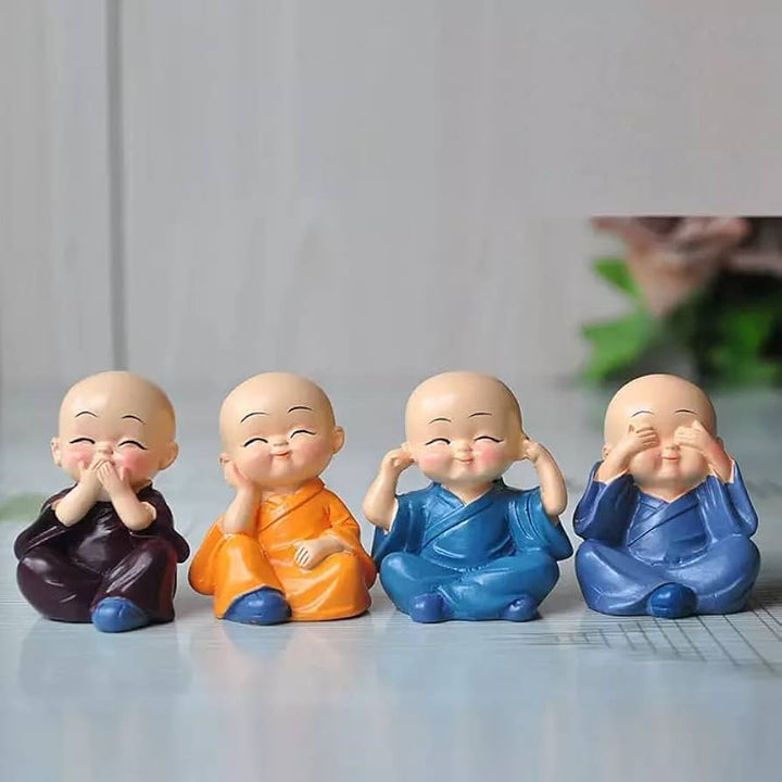 Rarejoy Gifts decorative monk figurine set featuring four smiling monk statues for home décor, office desks, meditation spaces, and gifting.