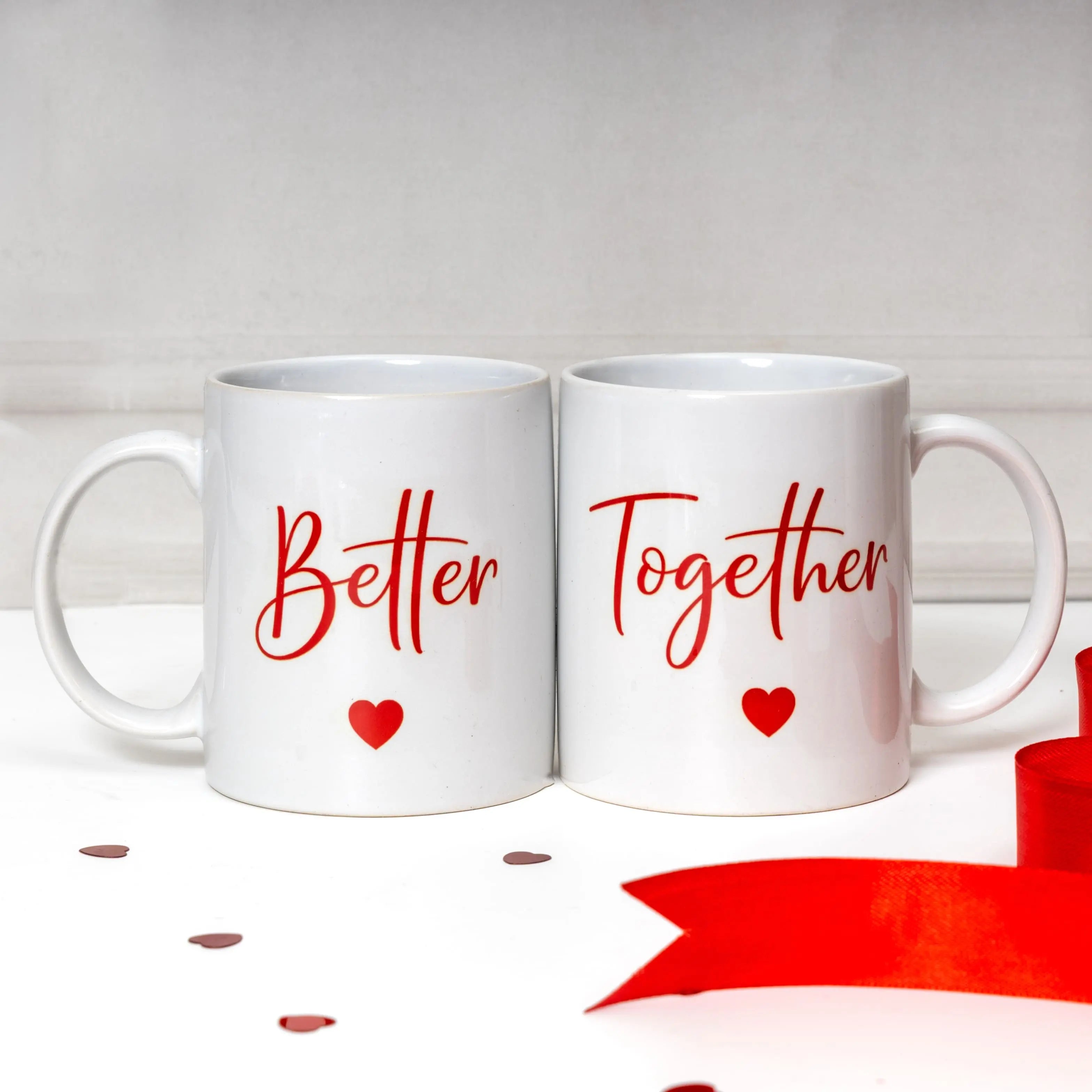 Two white mugs with 'Better Together' text and red hearts on a light gray background, Wedding and anniversary Gifts from Rarejoy
