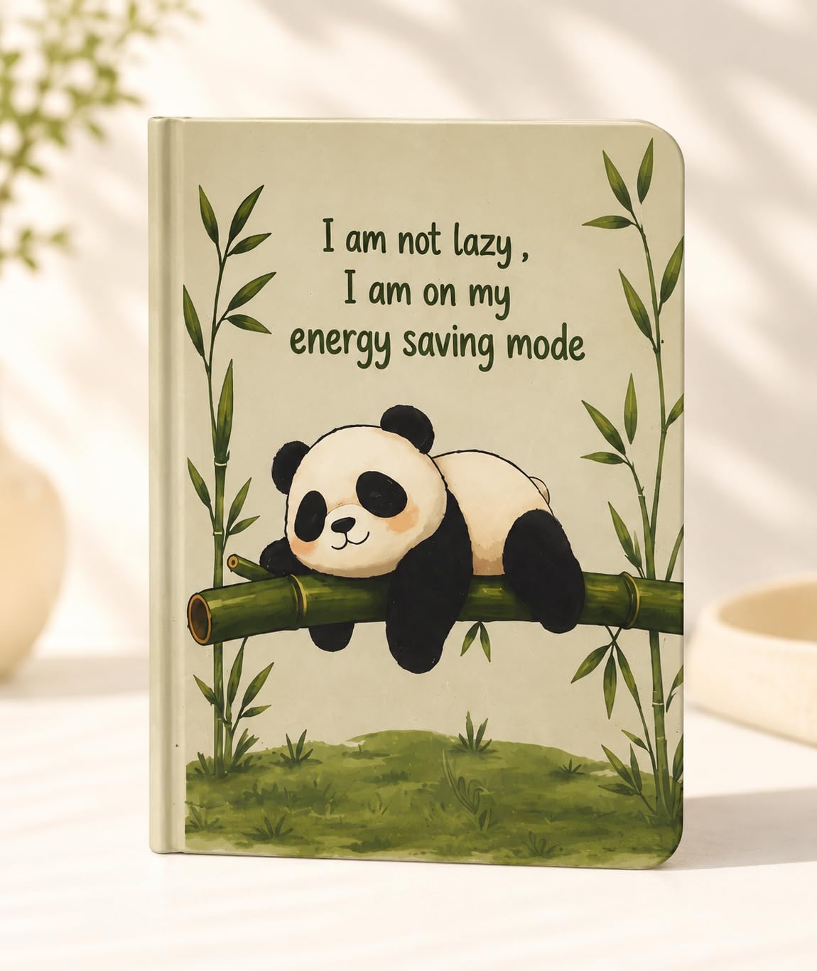 Cute panda-themed notebook featuring a sleeping panda on bamboo with the quote “I am not lazy, I am on my energy saving mode
