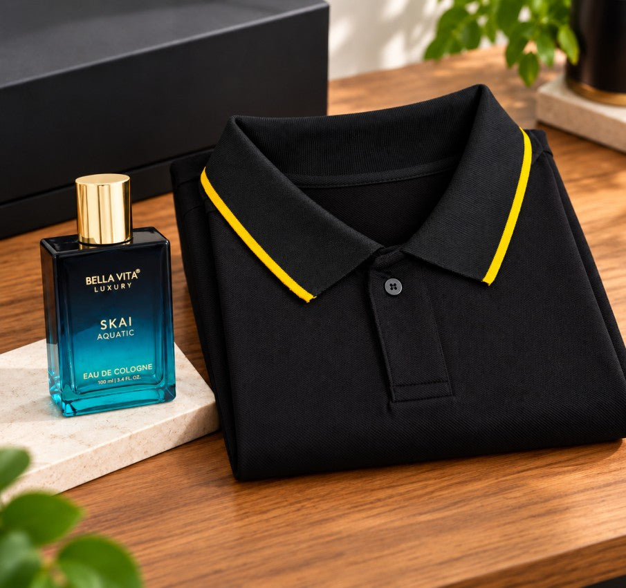 Black polo shirt with yellow collar trim and blue aquatic perfume displayed as a men’s gift set