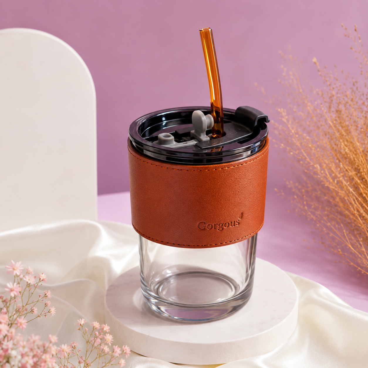 Rarejoy Gifts insulated glass tumbler with reusable straw, premium leather sleeve, and leakproof lid, perfect for coffee, tea, smoothies, and everyday hydration.